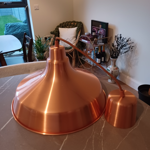 Two copper hanging lights