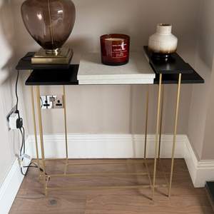Black and brass console 