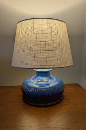 Artisan blue ceramic table lamp with linen shade